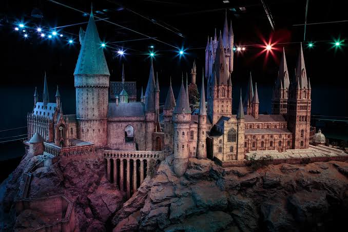 The illuminated Hogwarts castle model at the Warner Bros. Studio Tour London