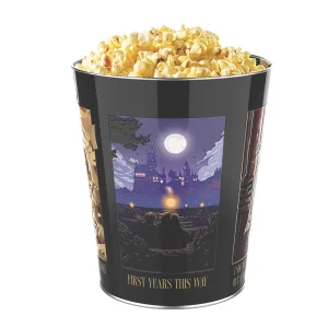The 25th anniversary popcorn tin filled with popcorn, showing its poster artwork panels