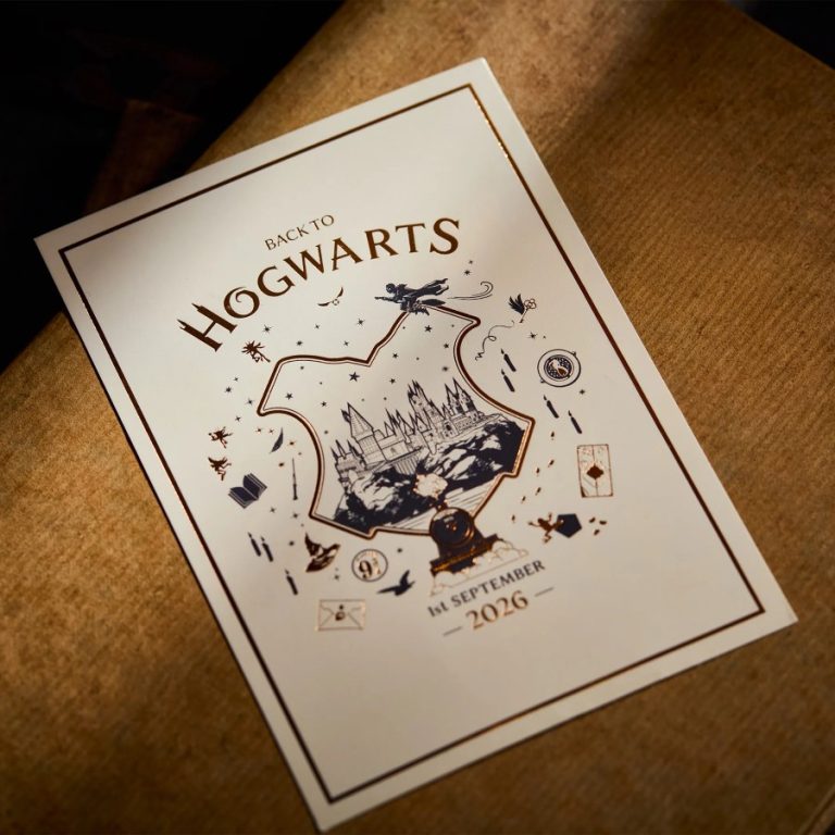 The Back to Hogwarts 2026 postcard printed in cream with gold foil Hogwarts Castle artwork