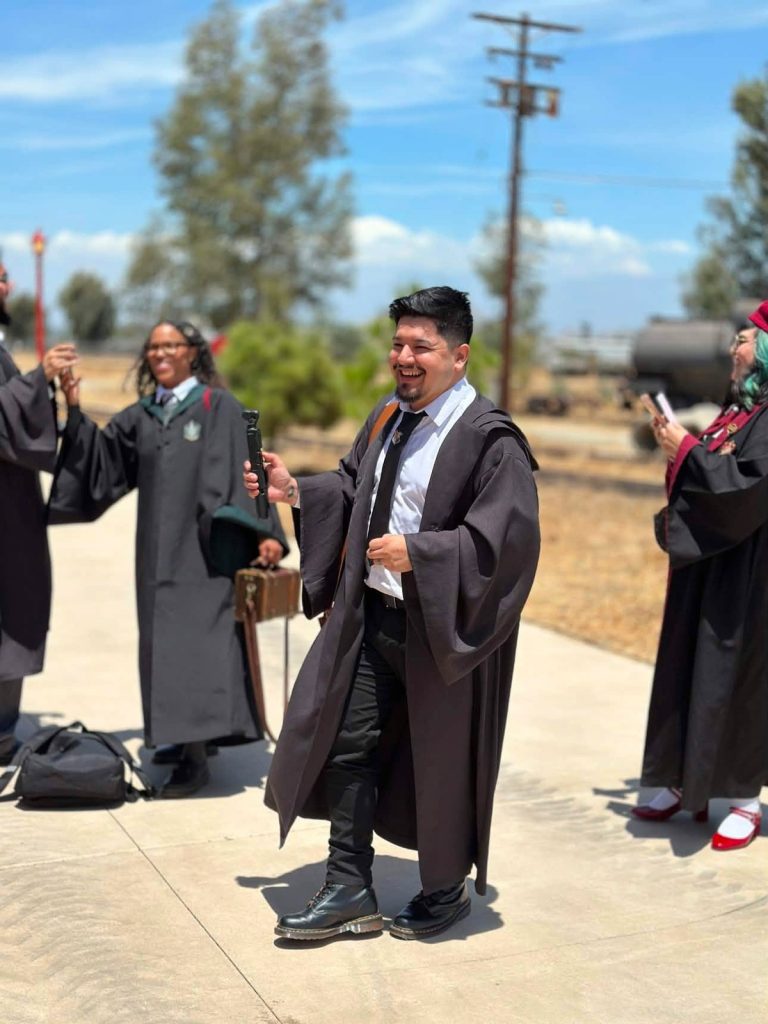 Guests walking to the carriages in Hogwarts robes